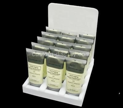 white acrylic skin care display stands