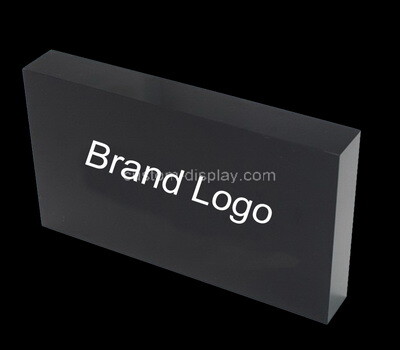 Custom black lucite brand block