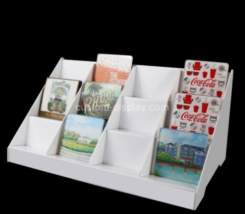 Custom white acrylic tiered shelf for displaying coasters